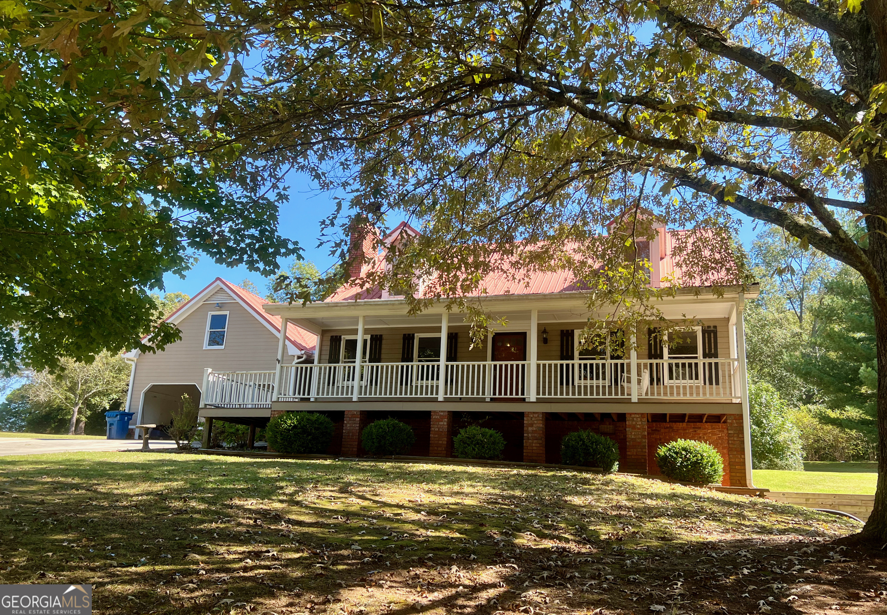 325 Sorrow Road Stockbridge, GA 30281 - Photo 1 of 1 a front view of a house with a garden