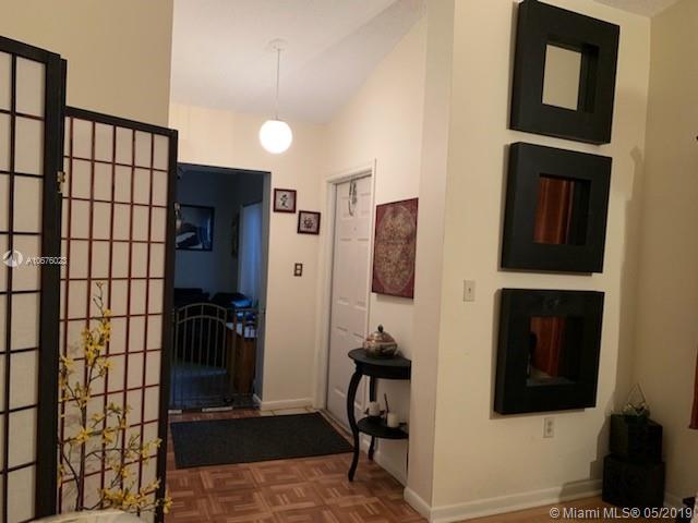 11495 Southwest 109th Road, Unit 11A Miami, FL 33176 - Photo 1 of 12 Foyer Entrance