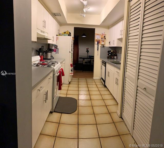 11495 Southwest 109th Road, Unit 11A Miami, FL 33176 - Photo 4 of 12 Kitchen view from entertainment room