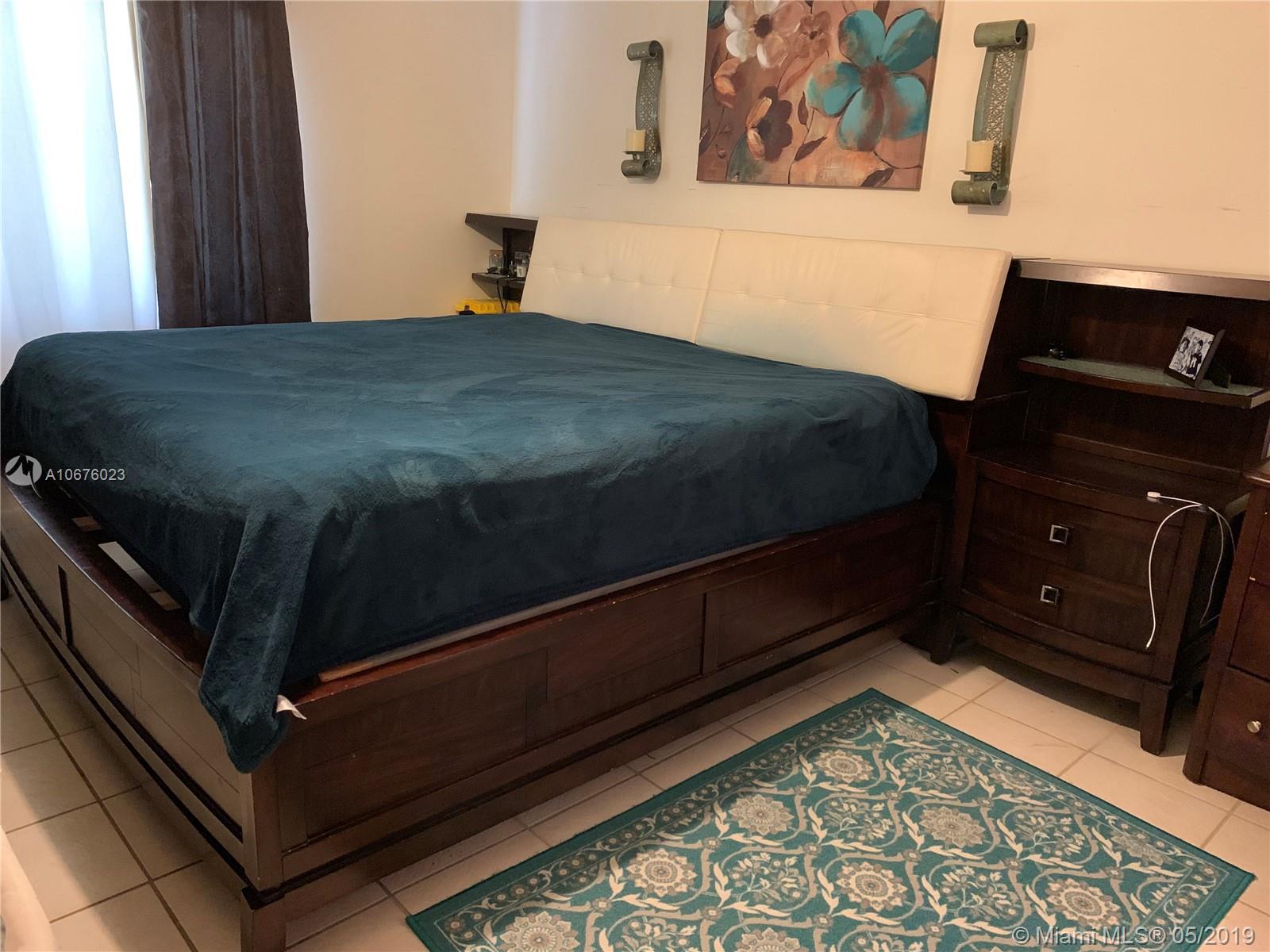 11495 Southwest 109th Road, Unit 11A Miami, FL 33176 - Photo 6 of 12 Master bedroom
