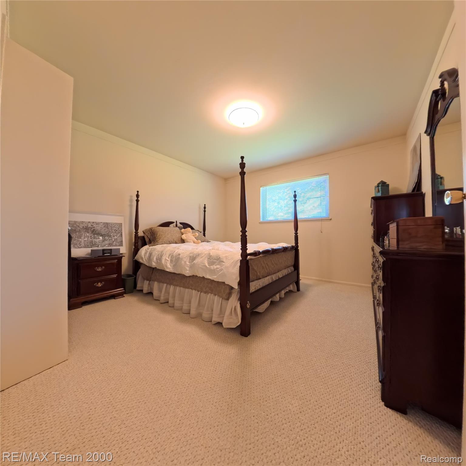 2104 Whittier Road Ypsilanti, MI 48197 - Photo 22 of 45 Bedroom with ornamental molding and light carpet