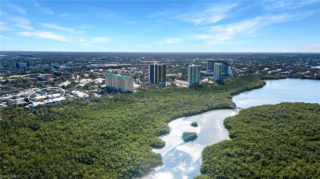5899 Chanteclair Drive, Unit 214 Naples, FL 34108 - Photo 23 of 24 an aerial view of a house with a yard