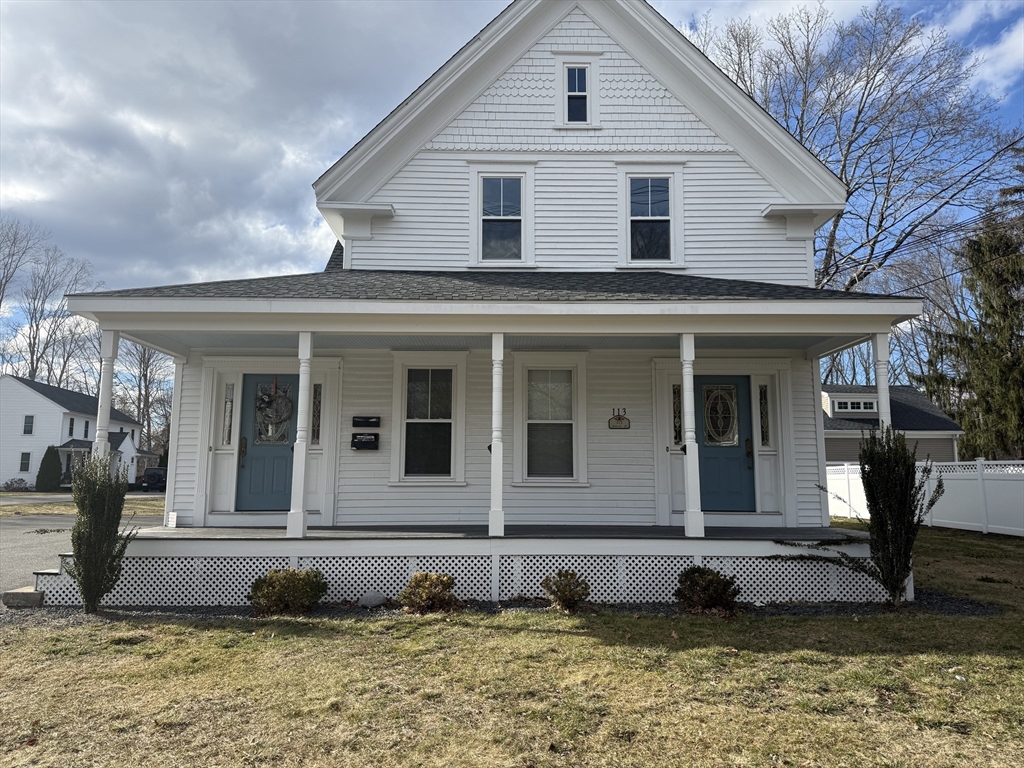 113 Union Street, Unit 2 Bridgewater, MA 02324 - Photo 1 of 9 a front view of a house with a yard
