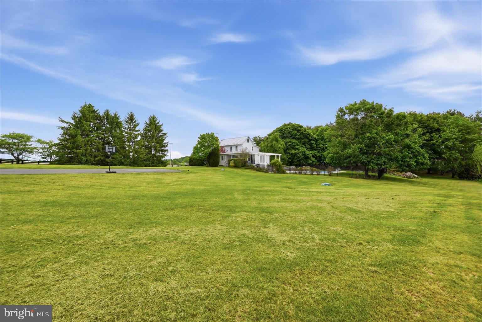 171 Laurel Grove Road Winchester, VA 22602 - Photo 54 of 81 a view of a green field with clear sky