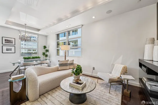 a living room with furniture and a table