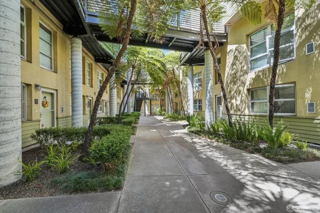 a view of a building with a garden