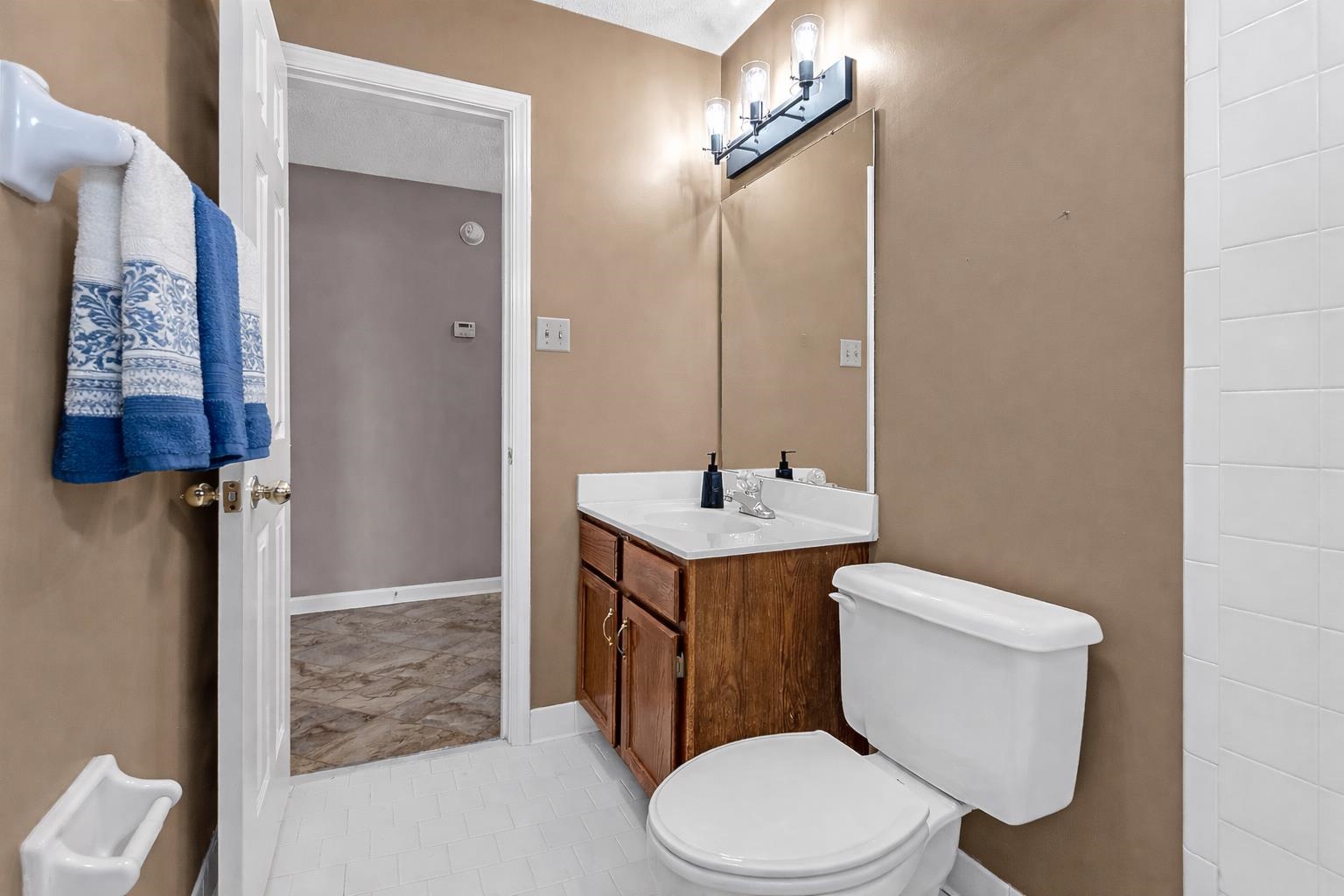 6512 Birch Mill Road Bartlett, TN 38135 - Photo 22 of 25 Bathroom with vanity and light tile patterned floors