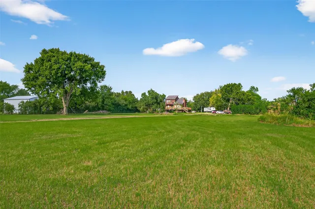 a view of building with green space