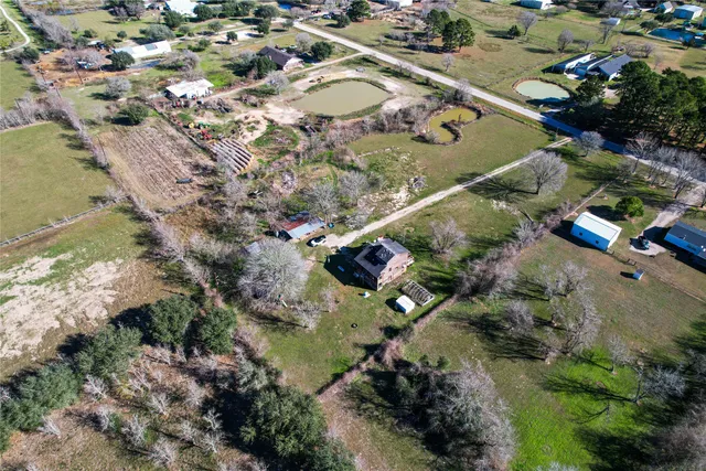 an aerial view of swimming pool and outdoor space