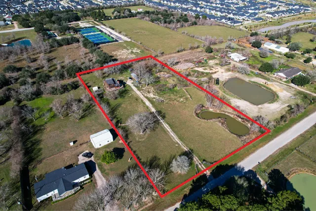 a view of swimming pool from a balcony