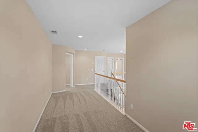 a view of hallway with stairs
