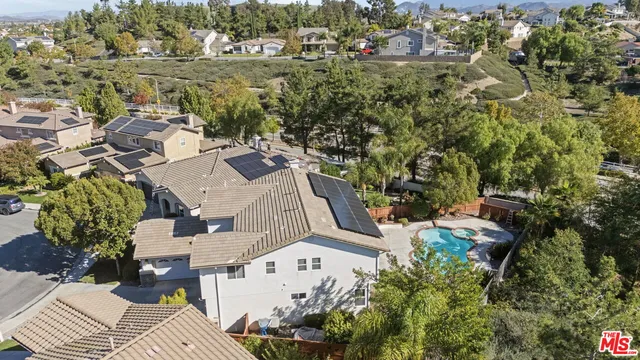 an aerial view of residential house with outdoor space