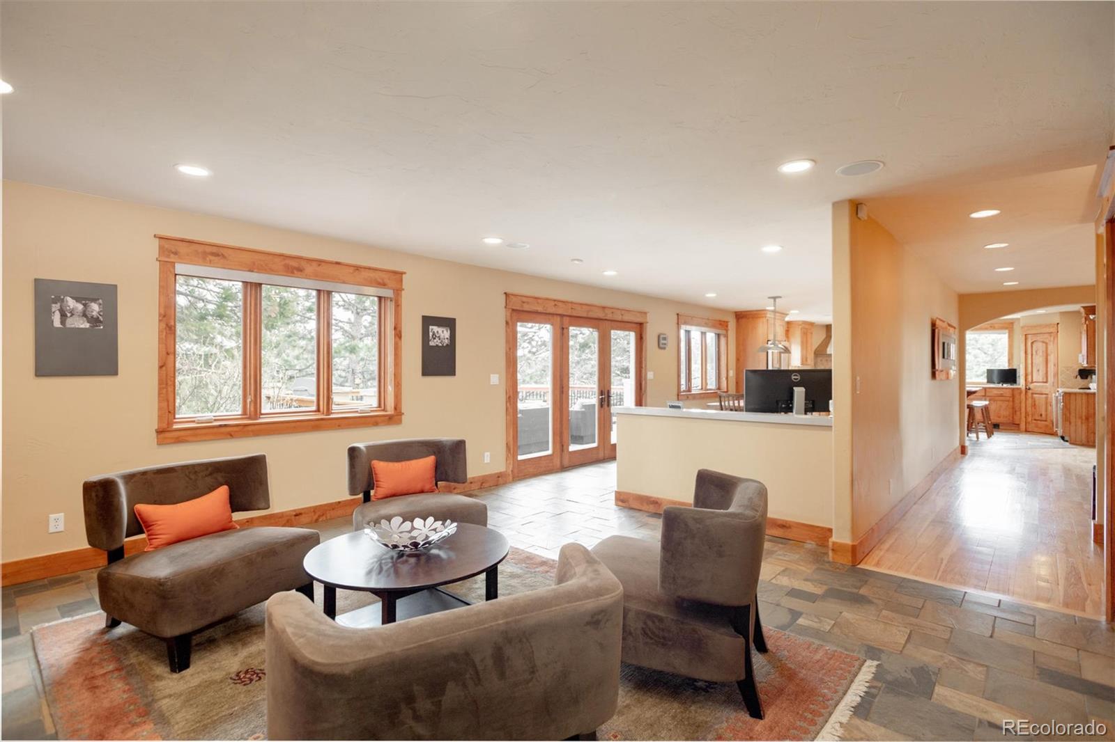 33231 Meadow Mountain Road Evergreen, CO 80439 - Photo 11 of 40 a living room with furniture and a large window