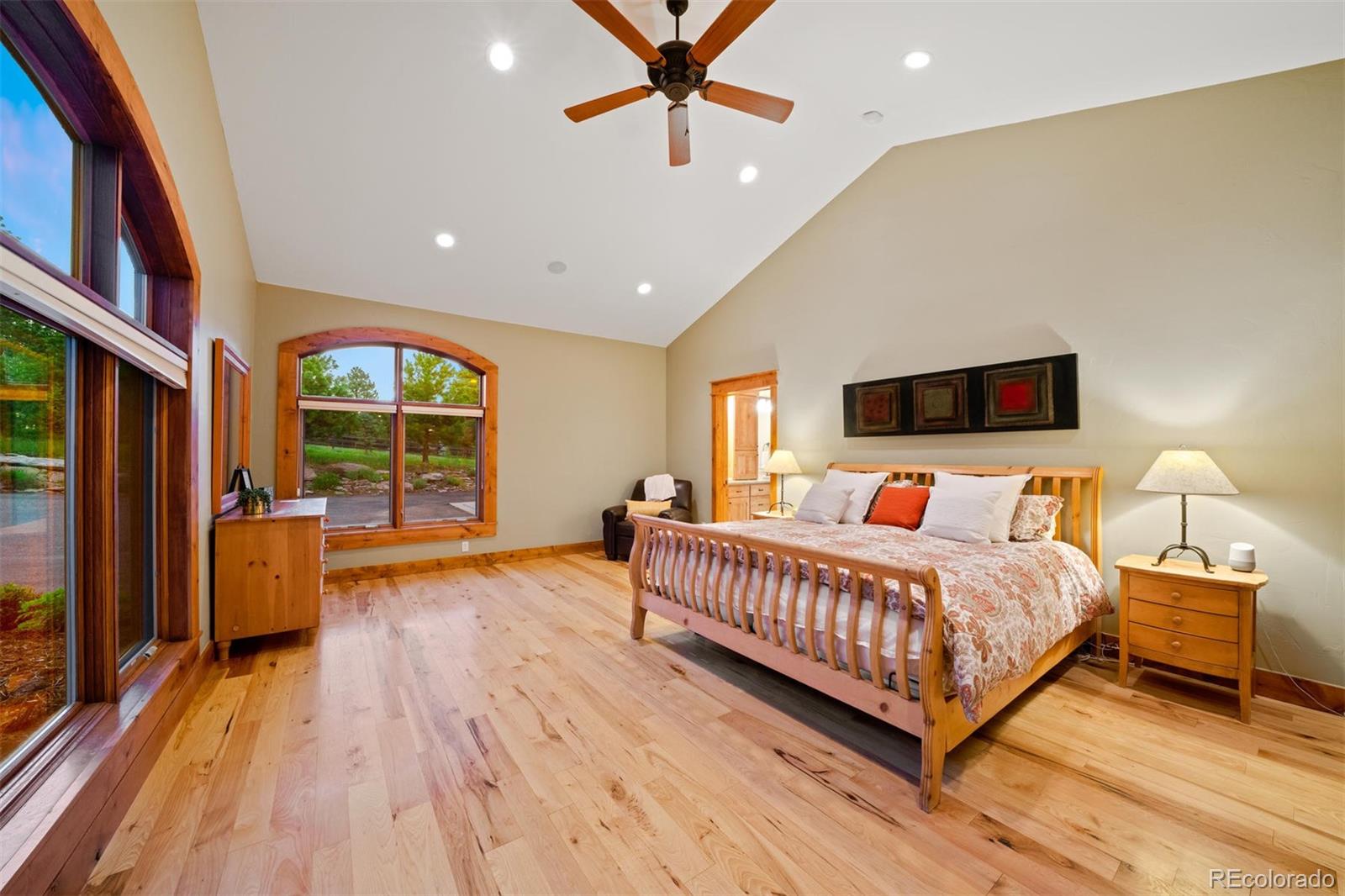 33231 Meadow Mountain Road Evergreen, CO 80439 - Photo 16 of 40 a bed room with a bed and a window