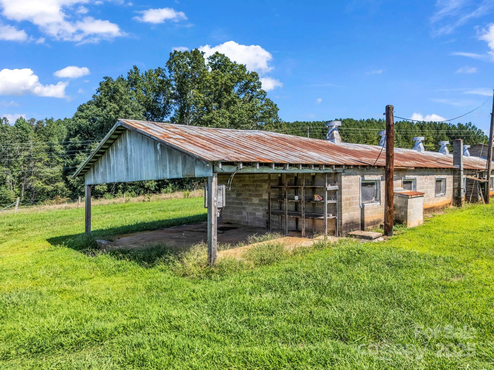83.67-acres Pleasant Grove Road Rutherfordton, NC 28139 - Photo 26 of 40 a view of a house with a yard