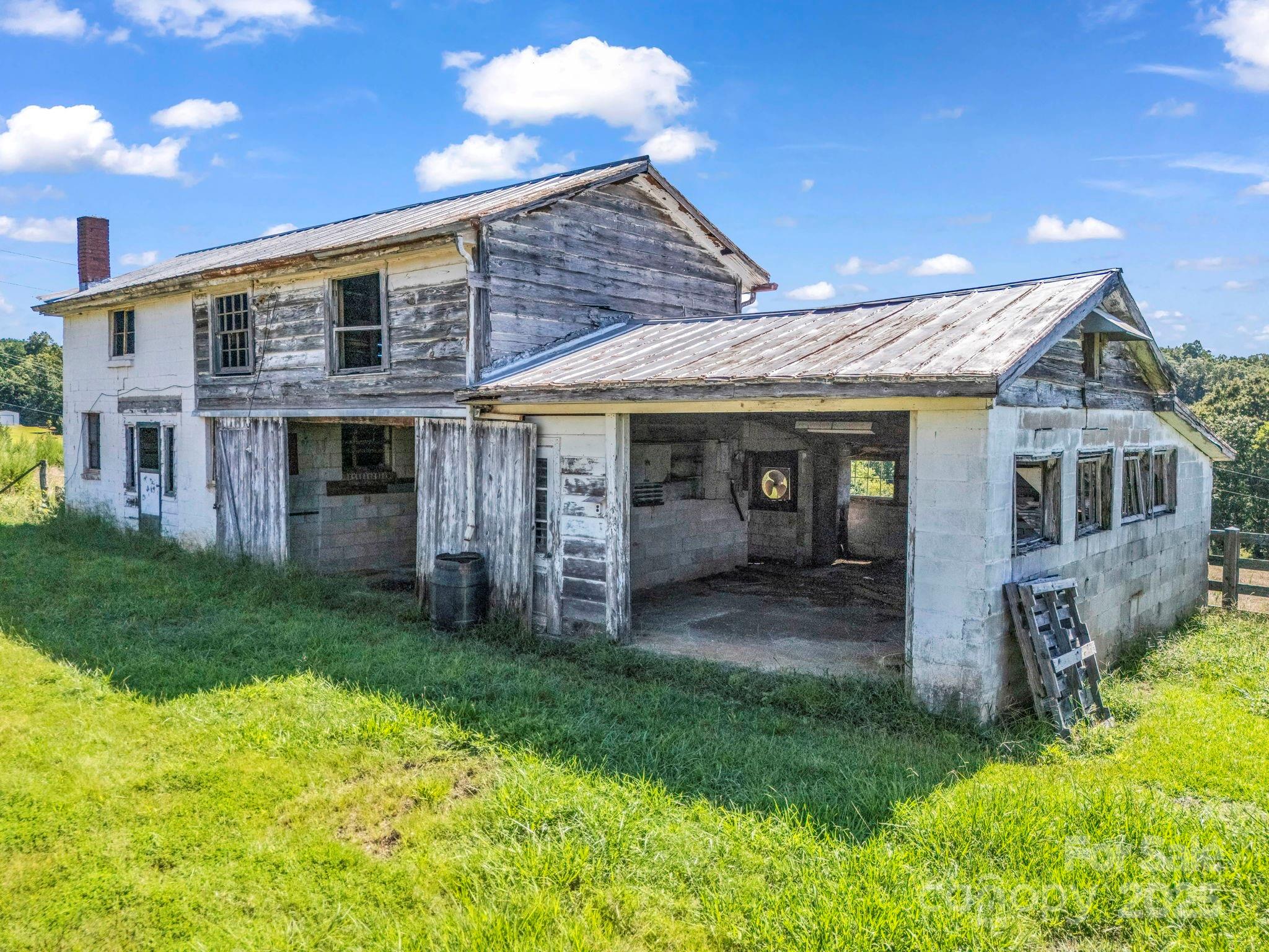 83.67-acres Pleasant Grove Road Rutherfordton, NC 28139 - Photo 6 of 40 front view of a house with a yard