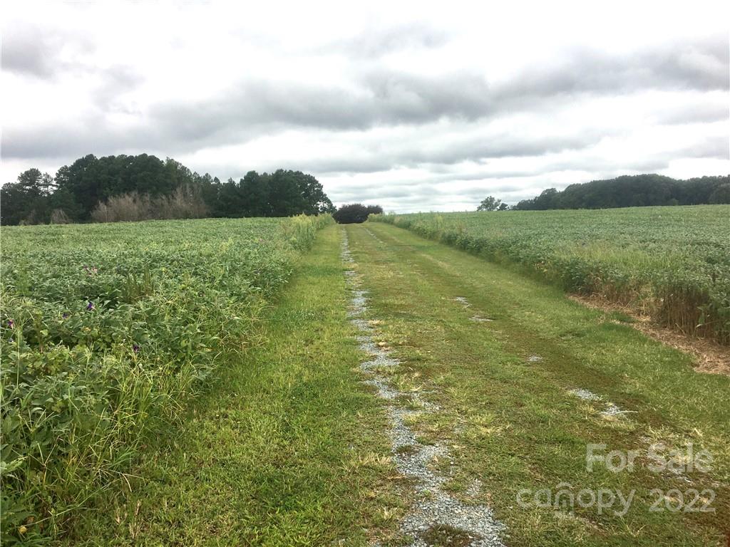 a view of a field with an outdoor space