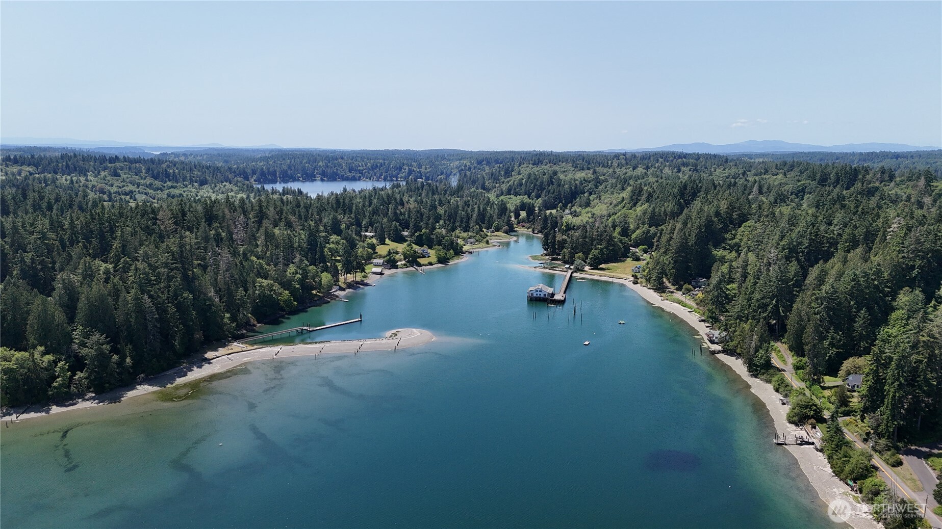 19789 Erickson Road Southwest Longbranch, WA 98349 - Photo 16 of 17 an aerial view of a city with lots of residential buildings