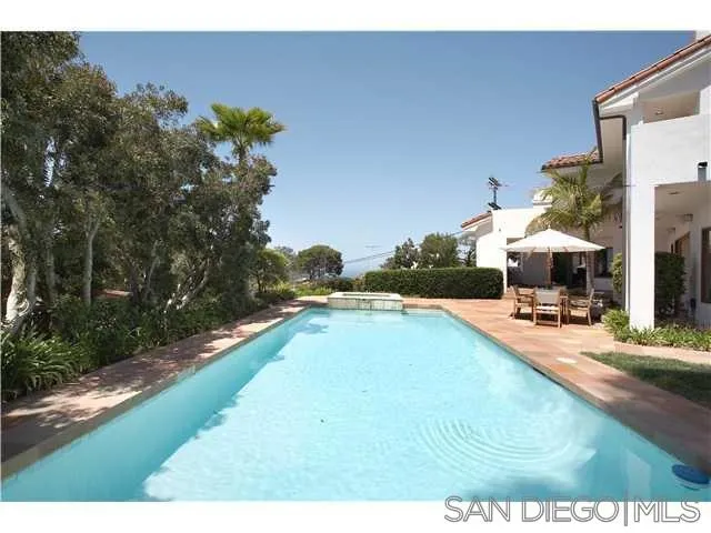 980 Crest Road Del Mar, CA 92014 - Photo 12 of 13 a swimming pool view with a outdoor seating