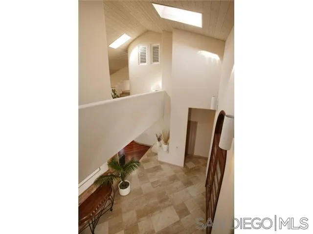 980 Crest Road Del Mar, CA 92014 - Photo 8 of 13 a view of kitchen with furniture and mirror