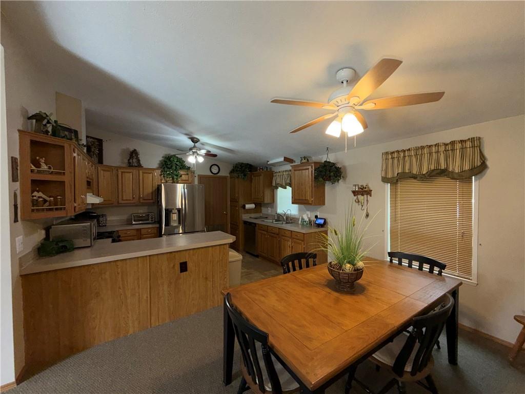 1881 Westford Road Jamestown, PA 16134 - Photo 16 of 50 a view of a dining room with furniture and a chandelier