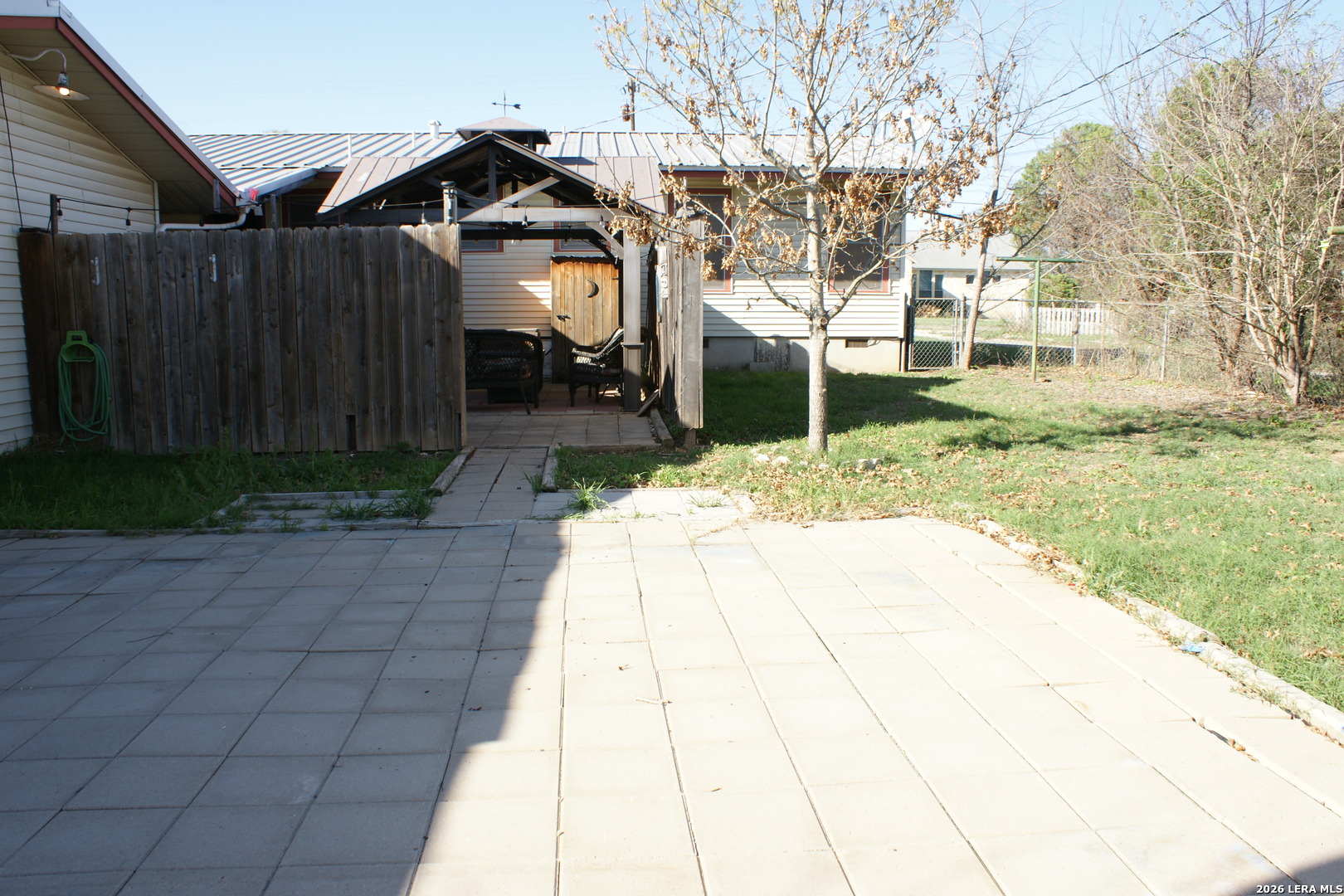 705 Altgelt Street Comfort, TX 78013 - Photo 6 of 14 a view of a backyard with sitting area