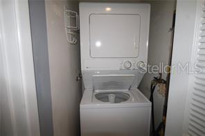 255 Mission Trail South, Unit J Venice, FL 34285 - Photo 11 of 15 a bathroom with a sink and a mirror