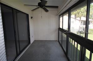255 Mission Trail South, Unit J Venice, FL 34285 - Photo 12 of 15 a view of empty room with windows