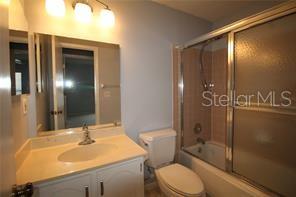 255 Mission Trail South, Unit J Venice, FL 34285 - Photo 8 of 15 a bathroom with a sink toilet and shower