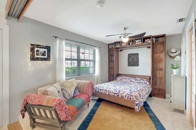 a bathroom with a toilet sink and shower