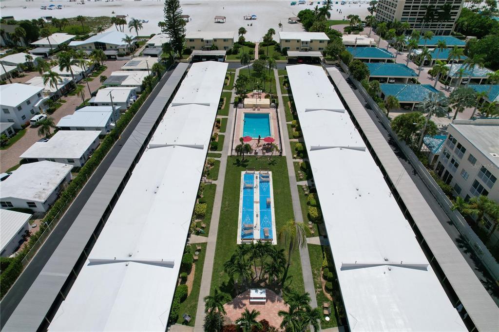 6006 Midnight Pass Road, Unit 16 Sarasota, FL 34242 - Photo 39 of 52 an aerial view of a residential houses with outdoor space
