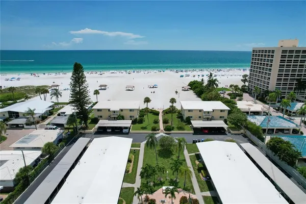 a view of outdoor space with palm trees