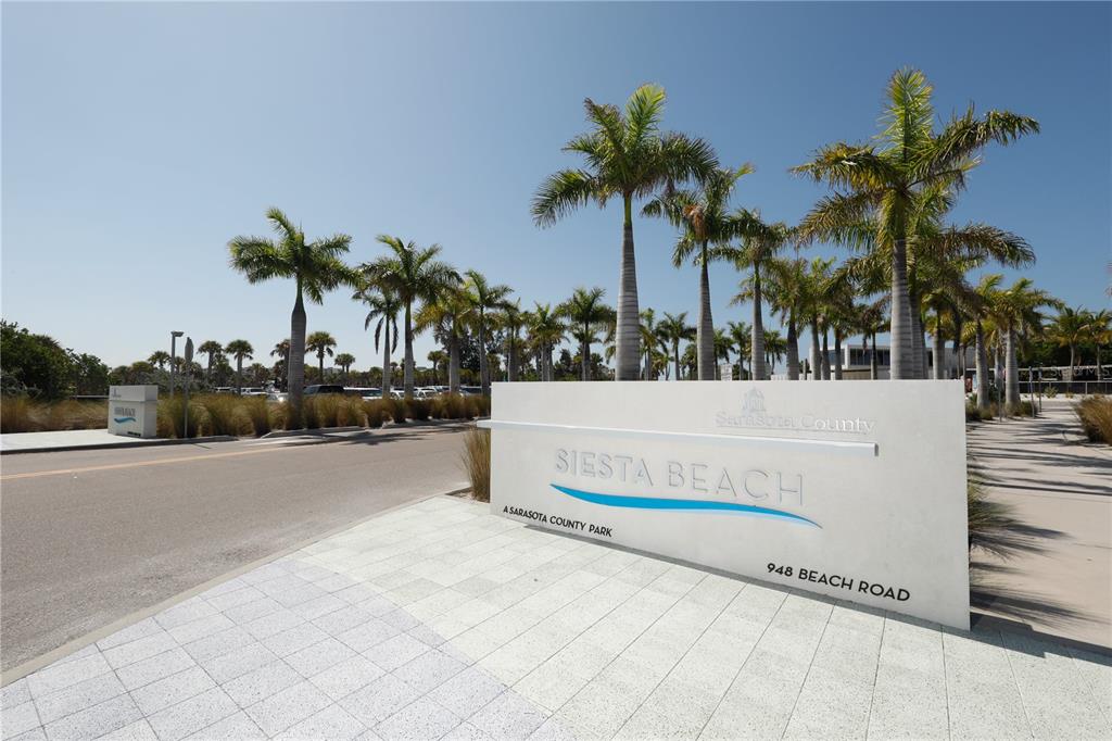 6006 Midnight Pass Road, Unit 16 Sarasota, FL 34242 - Photo 45 of 52 a view of outdoor space with palm trees
