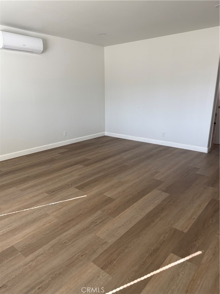 2315 11th Street Riverside, CA 92507 - Photo 3 of 16 a view of a room with wooden floor