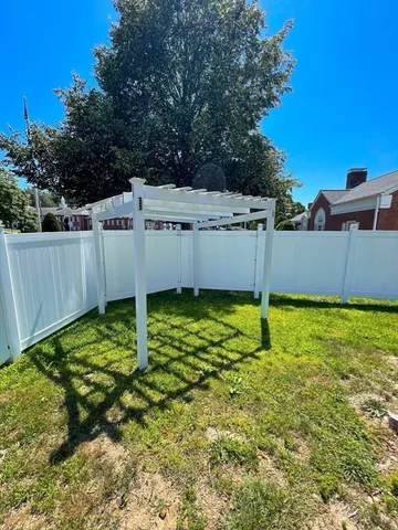 a view of a backyard with plants