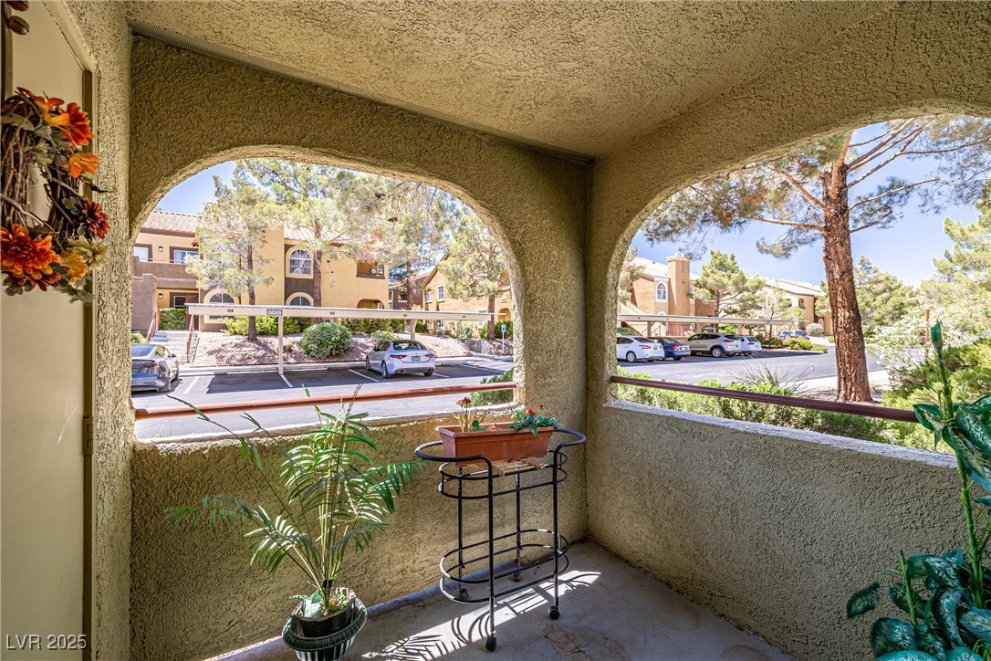 7950 West Flamingo Road, Unit 1024 Las Vegas, NV 89147 - Photo 17 of 30 Balcony featuring a residential view