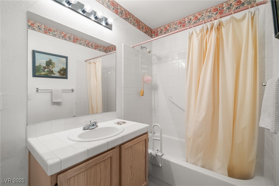 7950 West Flamingo Road, Unit 1024 Las Vegas, NV 89147 - Photo 23 of 30 Bathroom featuring shower / bath combination with