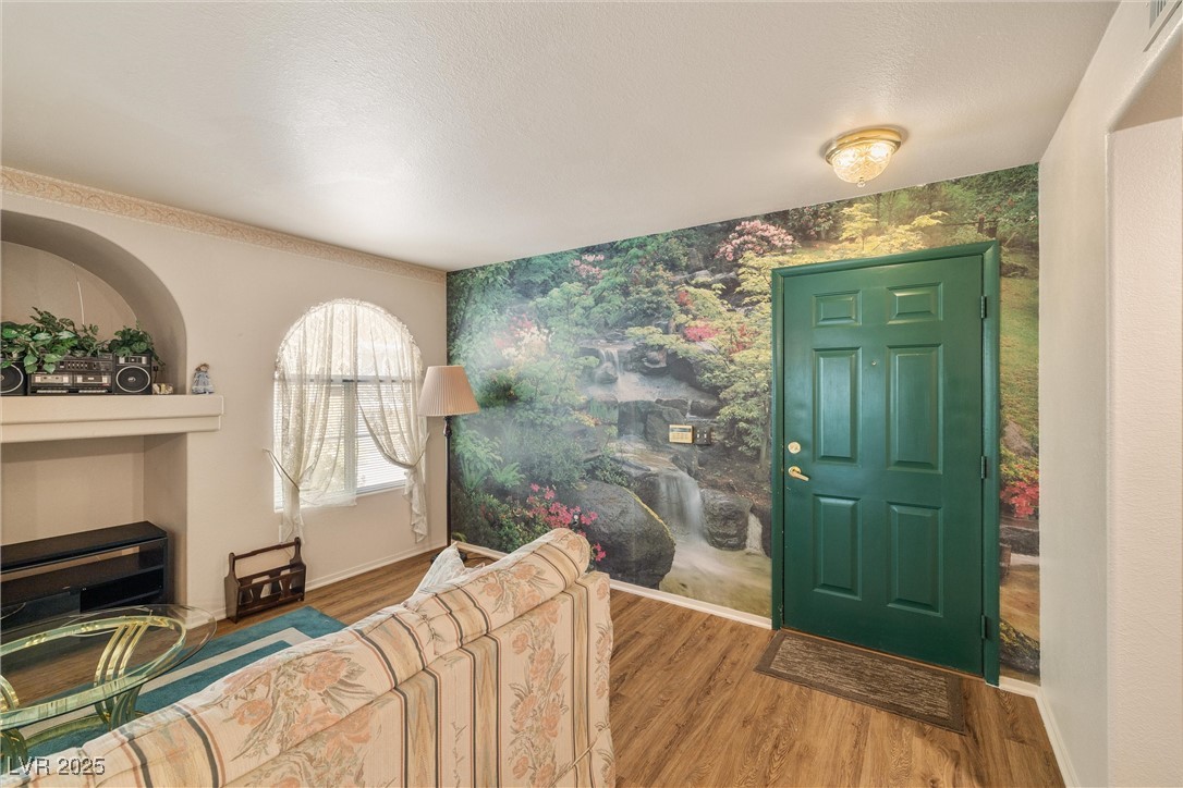 7950 West Flamingo Road, Unit 1024 Las Vegas, NV 89147 - Photo 6 of 30 Foyer entrance featuring wallpapered walls, an acc