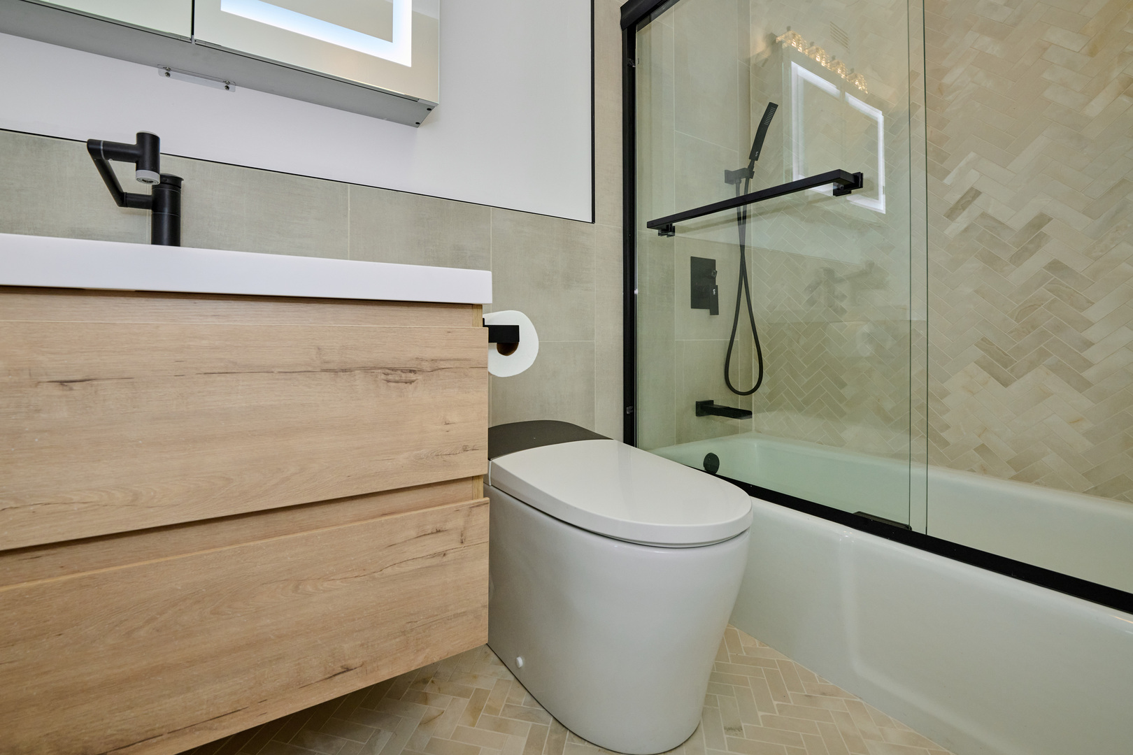 5415 North Sheridan Road, Unit 1908 Chicago, IL 60640 - Photo 19 of 45 a bathroom with a shower a toilet and sink