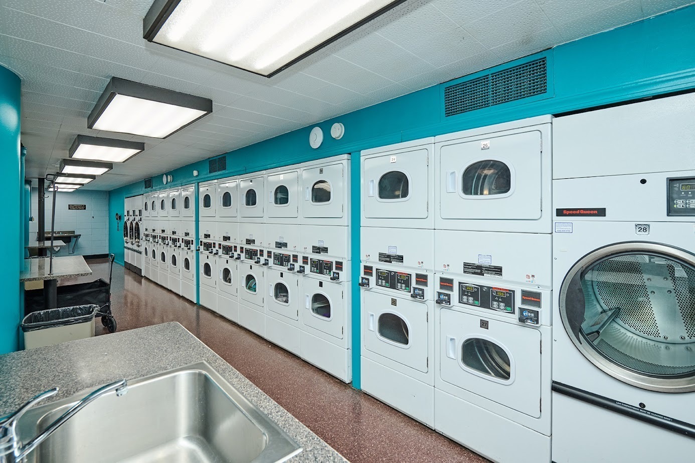 5415 North Sheridan Road, Unit 1908 Chicago, IL 60640 - Photo 41 of 45 a kitchen with stainless steel appliances granite countertop a sink and cabinets