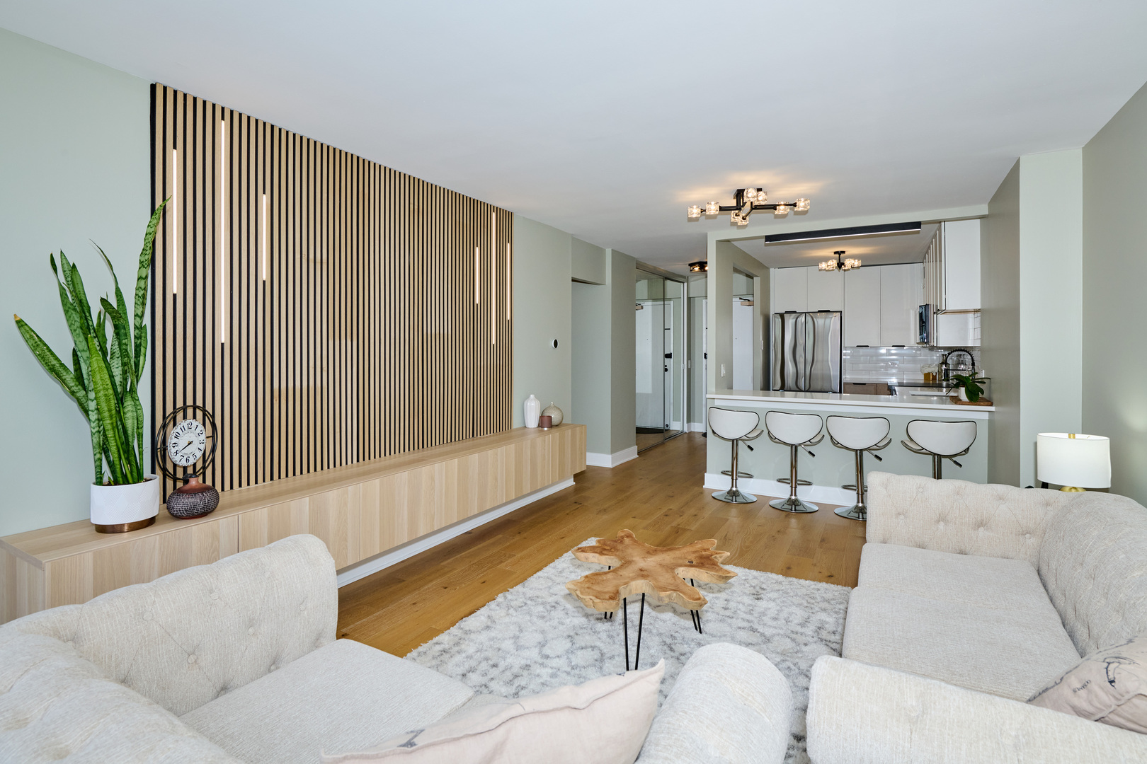 5415 North Sheridan Road, Unit 1908 Chicago, IL 60640 - Photo 7 of 45 a living room with furniture and a large window