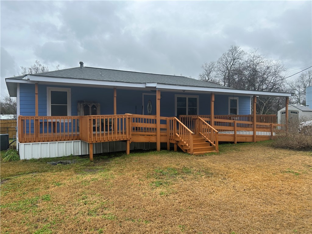 11525 4th Street North Zulch, TX 77872 - Photo 1 of 21 a view of a house with a backyard and porch