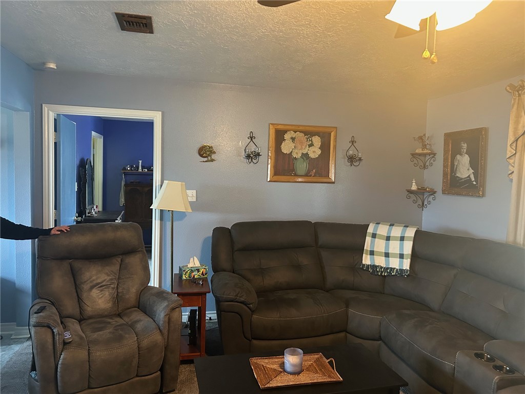 11525 4th Street North Zulch, TX 77872 - Photo 13 of 21 a living room with furniture and a couch