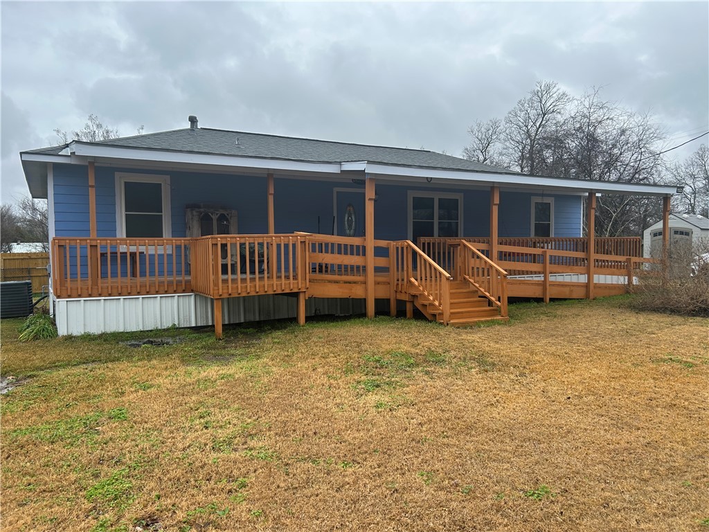11525 4th Street North Zulch, TX 77872 - Photo 20 of 21 a view of a house with backyard and sitting area