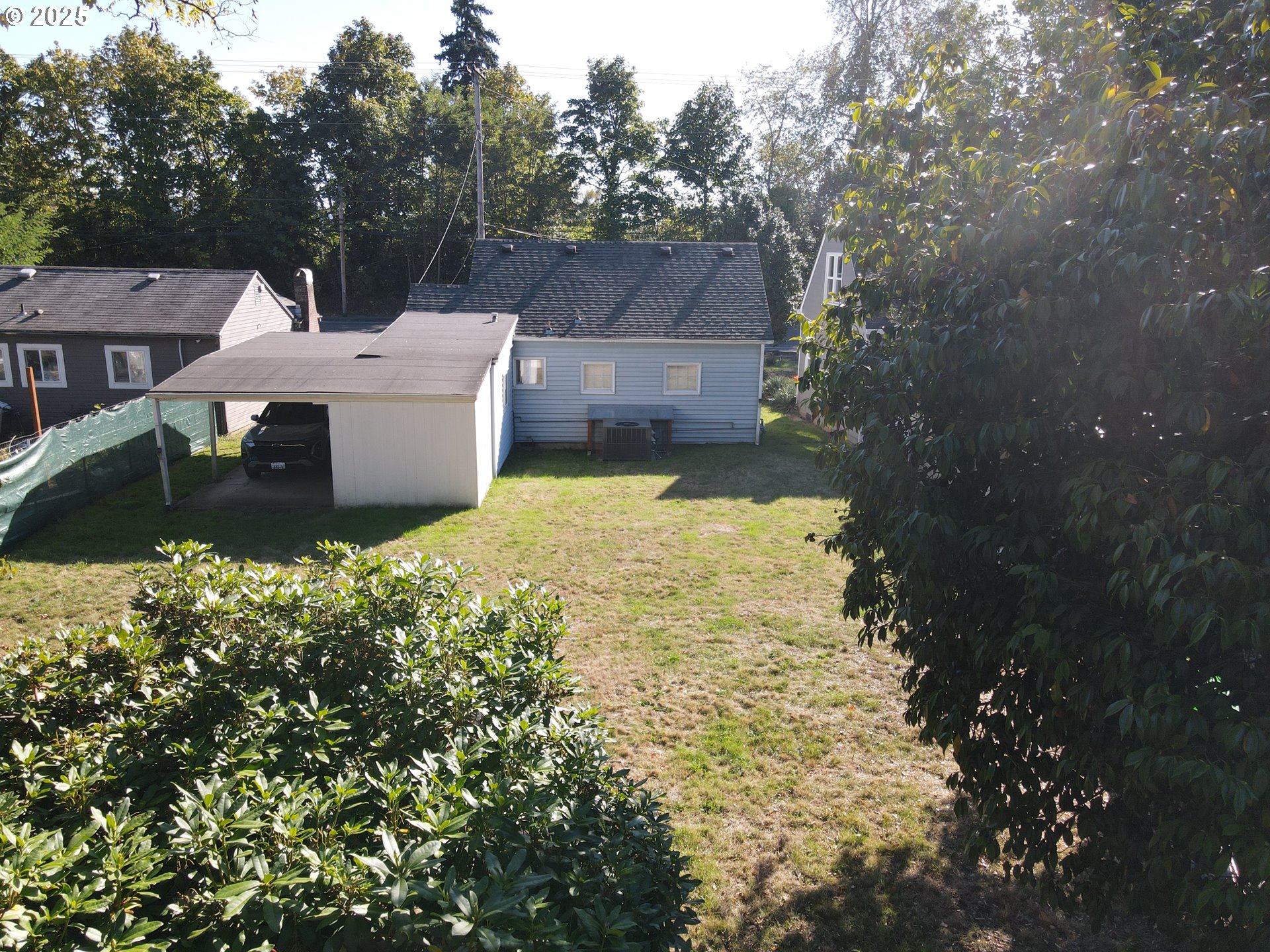 869 E Street Washougal, WA 98671 - Photo 8 of 14 a view of a house with a yard