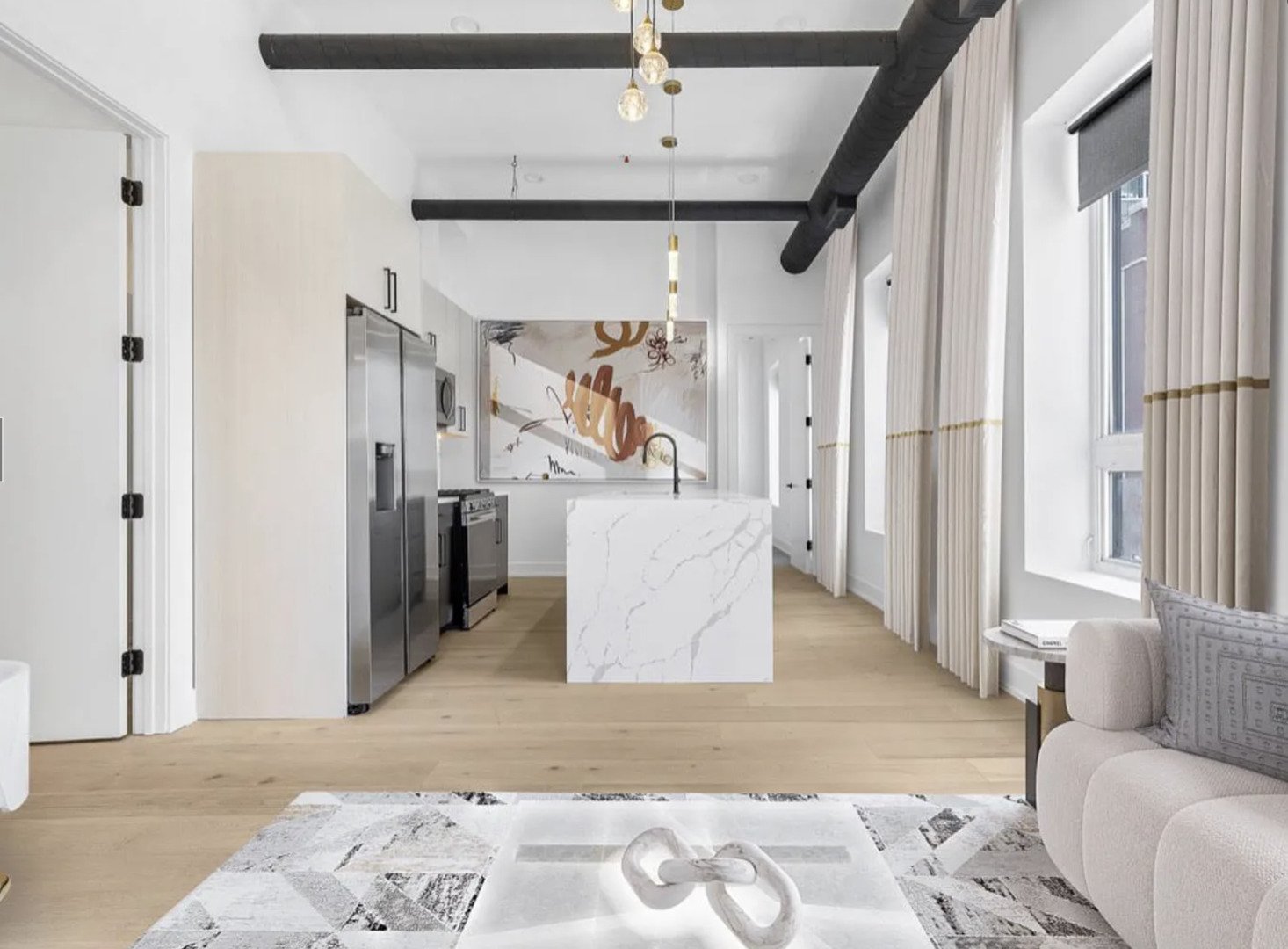 77 West Chestnut Street, Unit 2A Chicago, IL 60610 - Photo 6 of 13 a view of a hallway with furniture and a livingroom