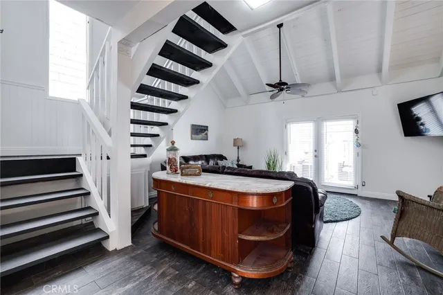 a kitchen with stainless steel appliances granite countertop a stove and a refrigerator