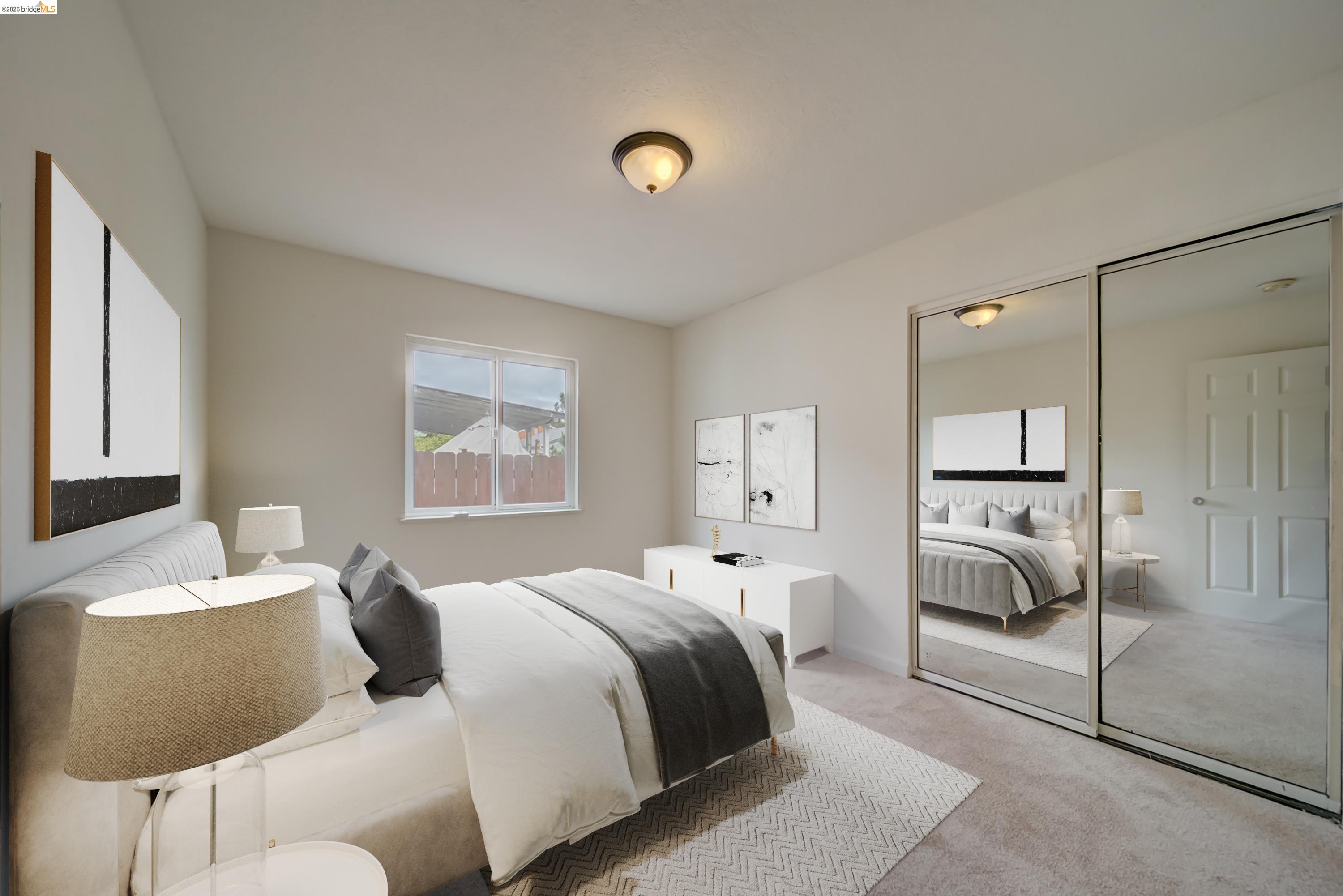 844 37th Street Richmond, CA 94805 - Photo 26 of 35 a bedroom with a bed and a lamp with window