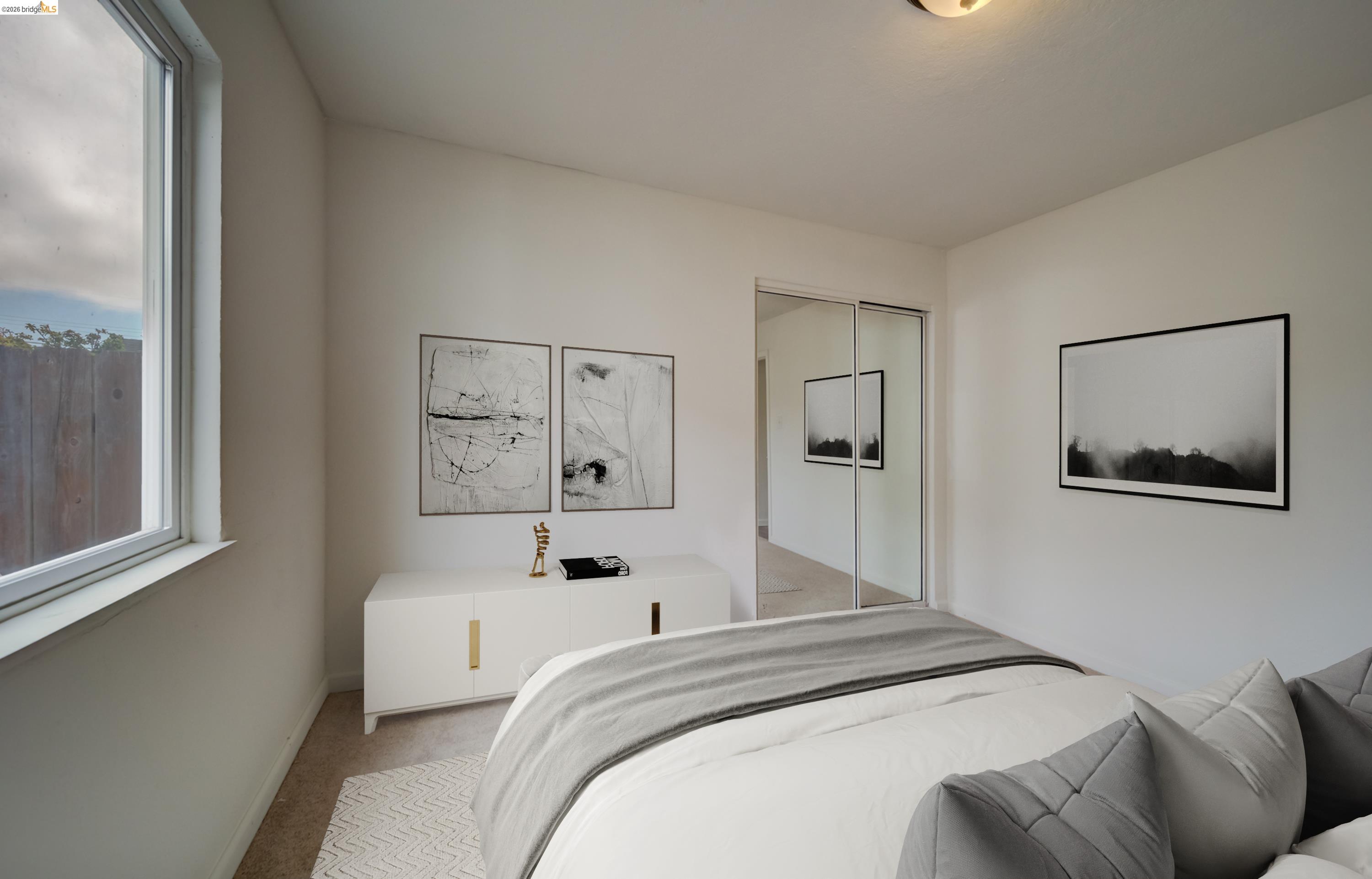 844 37th Street Richmond, CA 94805 - Photo 27 of 35 a bedroom with a bed and a window