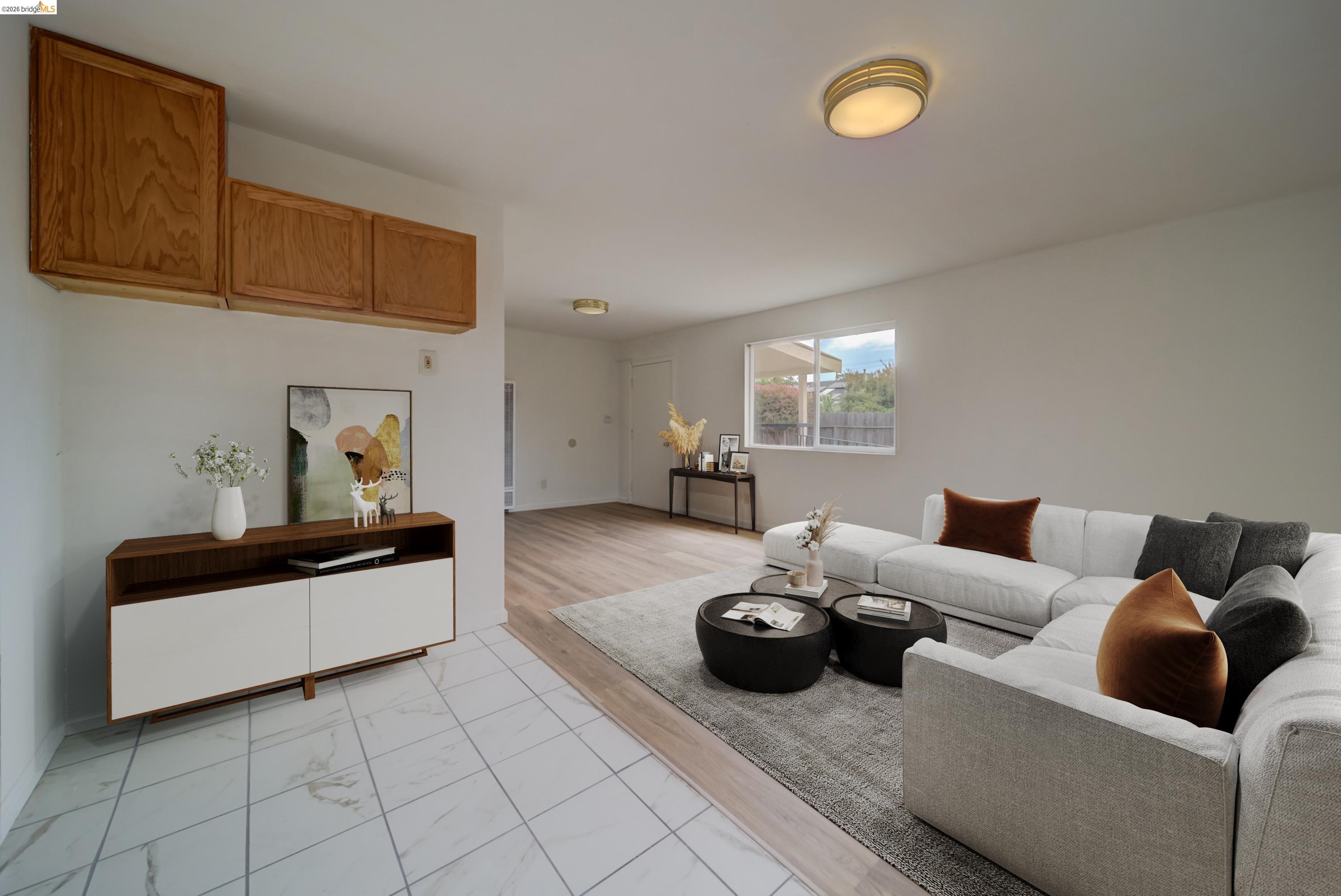 844 37th Street Richmond, CA 94805 - Photo 32 of 35 a living room with furniture and a flat screen tv